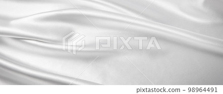 Draped silk white cloth background texture Draped silk white cloth background texture 98964491