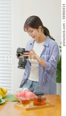 Photographer taking picture 98966914