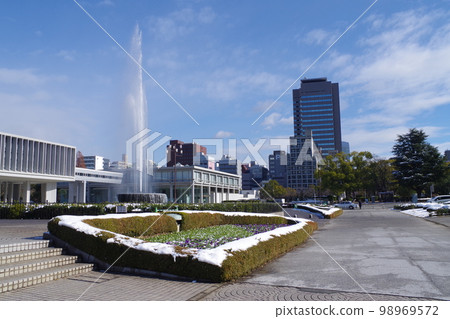 View of the snow-covered fountain at Peace Memorial Park Prayer Fountain 98969572