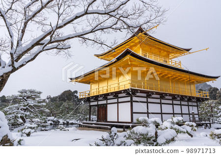 Snowy Kinkaku-ji Temple in winter. Famous tourist attraction in Kyoto, Japan. The Golden Pavilion, Kinkakuji, rokuon-ji, rokuon-ji. Snow landscape. 98971713