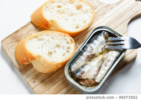 Canned oil sardines and baguette 98973802