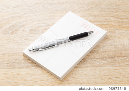 postcard on the desk postcard on the desk 98973846