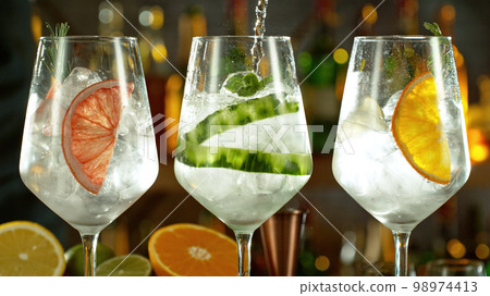 Preparation of cocktail drinks on bar. Preparation of cocktail drinks on bar. 98974413