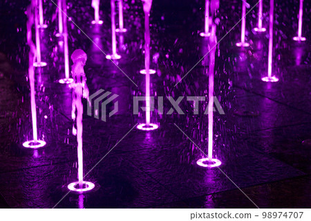 Illunminated purple splash pads 98974707
