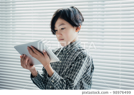 boy obsessed with tablet boy obsessed with tablet 98976499