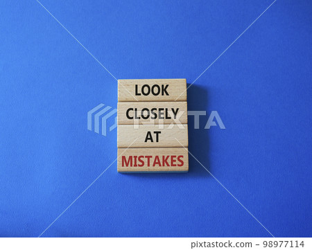 Look closely at mistakes symbol. Wooden blocks with words Look closely at mistakes. Beautiful blue background. Business and Look closely at mistakes concept. Copy space. Look closely at mistakes symbol. Wooden blocks with words Look closely at mistakes. Beautiful blue background. Business and Look closely at mistakes concept. Copy space. 98977114
