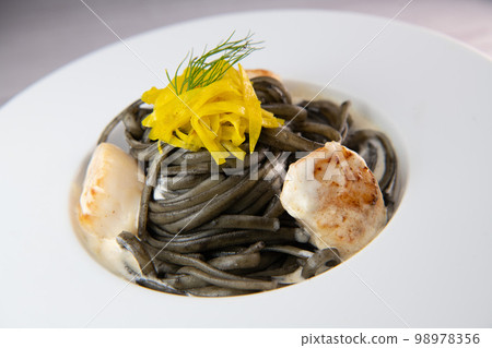 Recipe for Linguine Pasta with squid ink and scallops, yellow chioggia beet Recipe for Linguine Pasta with squid ink and scallops, yellow chioggia beet 98978356
