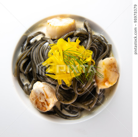 Recipe for Linguine Pasta with squid ink and scallops, yellow chioggia beet Recipe for Linguine Pasta with squid ink and scallops, yellow chioggia beet 98978379