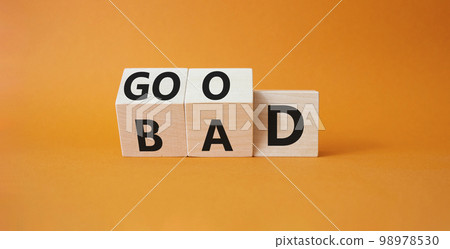 Good vs Bad symbol. Wooden cubes with words Bad and Good. Beautiful orange background. Business and Good vs Bad concept. Copy space Good vs Bad symbol. Wooden cubes with words Bad and Good. Beautiful orange background. Business and Good vs Bad concept. Copy space 98978530