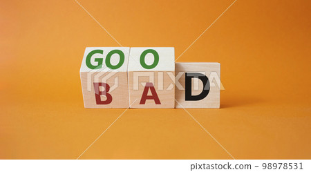 Good vs Bad symbol. Wooden cubes with words Bad and Good. Beautiful orange background. Business and Good vs Bad concept. Copy space 98978531