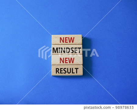 Mindset symbol. Wooden blocks with words New Mindset new Result. Beautiful blue background. Business and New Mindset new Result concept. Copy space. 98978633