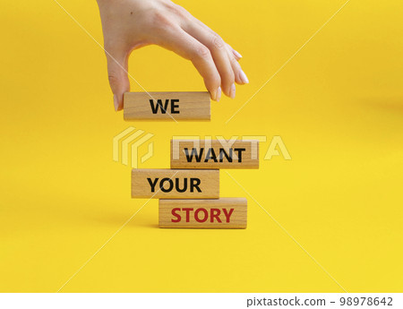 We want your story symbol. Concept words We want your story on wooden blocks. Beautiful yellow background. Businessman hand. Business and We want your story concept. Copy space. We want your story symbol. Concept words We want your story on wooden blocks. Beautiful yellow background. Businessman hand. Business and We want your story concept. Copy space. 98978642
