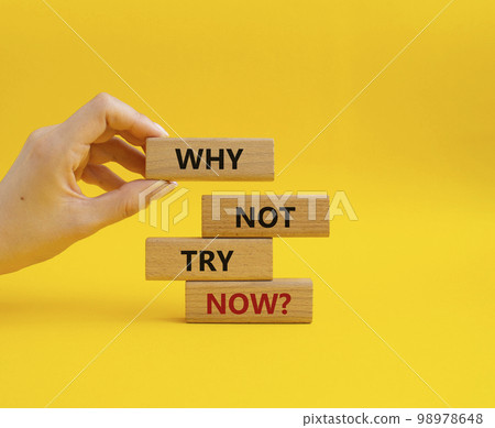Why not try symbol. Concept words Why not try on wooden blocks. Beautiful yellow background. Businessman hand. Business and Why not try concept. Copy space. Why not try symbol. Concept words Why not try on wooden blocks. Beautiful yellow background. Businessman hand. Business and Why not try concept. Copy space. 98978648