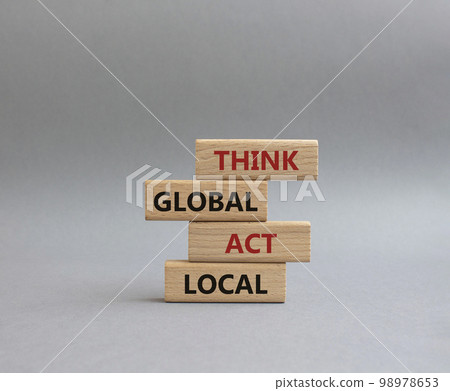 Think global act local symbol. Wooden blocks with words Think global act local. Beautiful grey background. Business and Think global act local concept. Copy space. 98978653
