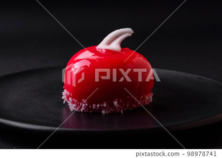 Beautiful tasty cake red color cheesecake in the shape of a heart Beautiful tasty cake red color cheesecake in the shape of a heart 98978741