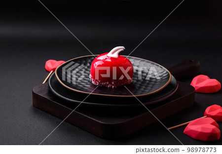Beautiful tasty cake red color cheesecake in the shape of a heart 98978773