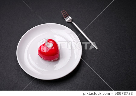 Beautiful tasty cake red color cheesecake in the shape of a heart 98978788