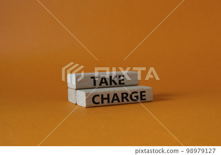 Take charge symbol. Wooden blocks with words Take charge. Beautiful orange background. Business and Take charge concept. Copy space. Take charge symbol. Wooden blocks with words Take charge. Beautiful orange background. Business and Take charge concept. Copy space. 98979127