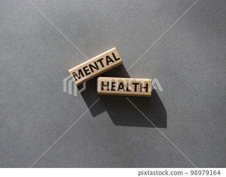 Mental health symbol. Wooden blocks with words Mental health. Beautiful grey background. Business and Mental health concept. Copy space. 98979164