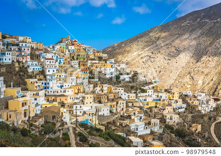 Hillside colorful homes in the old tradition village Olympos 98979548