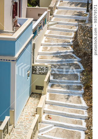 Steep and narrow stairwell in Olymbos village Steep and narrow stairwell in Olymbos village 98979571