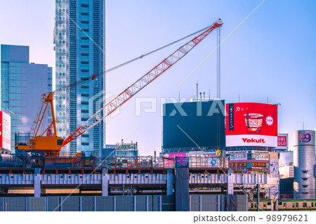 Cityscape of Tokyo, Japan, view of large cranes, etc. turned to the upper steel frame end of Shibuya Station Cityscape of Tokyo, Japan, view of large cranes, etc. turned to the upper steel frame end of Shibuya Station 98979621
