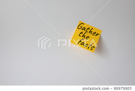 Gather the facts symbol. Concept words Gather the facts on orange steaky note. Beautiful white background. Business and Gather the facts concept. Copy space. Gather the facts symbol. Concept words Gather the facts on orange steaky note. Beautiful white background. Business and Gather the facts concept. Copy space. 98979805