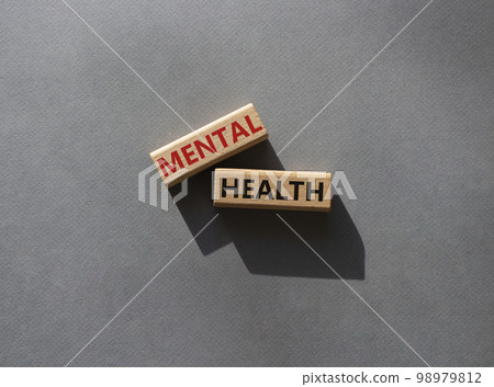 Mental health symbol. Wooden blocks with words Mental health. Beautiful grey background. Business and Mental health concept. Copy space. Mental health symbol. Wooden blocks with words Mental health. Beautiful grey background. Business and Mental health concept. Copy space. 98979812