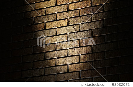 Light shining on brick wall 98982071