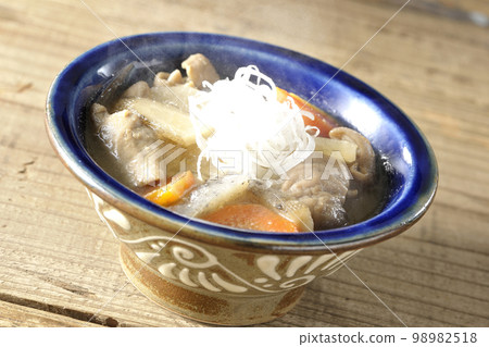 Hot pork offal stew with carrot, konjac, burdock and radish Hot pork offal stew with carrot, konjac, burdock and radish 98982518