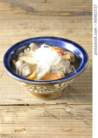 Hot pork offal stew with carrot, konjac, burdock and radish Hot pork offal stew with carrot, konjac, burdock and radish 98982537