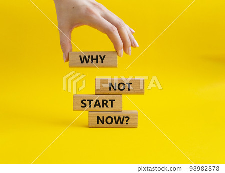 Why not start now symbol. Concept words Why not start now on wooden blocks. Beautiful yellow background. Businessman hand. Business and Why not start now concept. Copy space. Why not start now symbol. Concept words Why not start now on wooden blocks. Beautiful yellow background. Businessman hand. Business and Why not start now concept. Copy space. 98982878