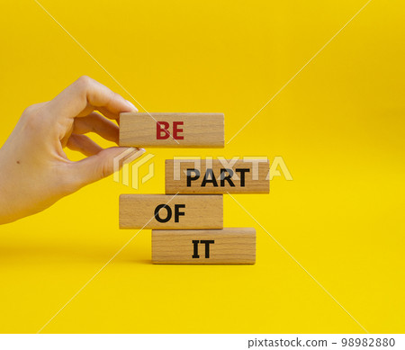Be part of it symbol. Concept words Be part of it on wooden blocks. Beautiful yellow background. Businessman hand. Business and Be part of it concept. Copy space. Be part of it symbol. Concept words Be part of it on wooden blocks. Beautiful yellow background. Businessman hand. Business and Be part of it concept. Copy space. 98982880