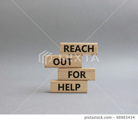 Reach out for help symbol. Wooden blocks with words Reach out for help. Beautiful grey background. Business and Reach out for help concept. Copy space. Reach out for help symbol. Wooden blocks with words Reach out for help. Beautiful grey background. Business and Reach out for help concept. Copy space. 98983434