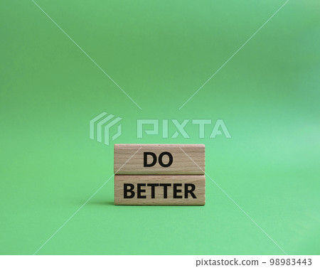 Do better symbol. Wooden blocks with words Do better. Beautiful green background. Business and Do better concept. Copy space. Do better symbol. Wooden blocks with words Do better. Beautiful green background. Business and Do better concept. Copy space. 98983443