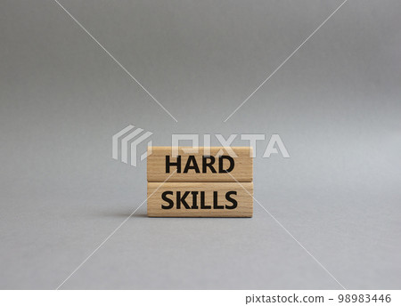 Hard skills symbol. Wooden blocks with words Hard skills. Beautiful grey background. Businessman hand. Business and Hard skills concept. Copy space Hard skills symbol. Wooden blocks with words Hard skills. Beautiful grey background. Businessman hand. Business and Hard skills concept. Copy space 98983446
