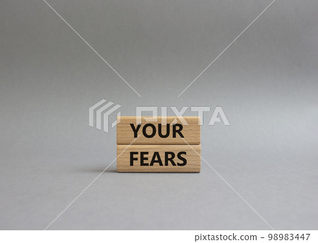 Your fears symbol. Wooden blocks with words Your fears. Beautiful grey background. Business and Your fears concept. Copy space. Your fears symbol. Wooden blocks with words Your fears. Beautiful grey background. Business and Your fears concept. Copy space. 98983447