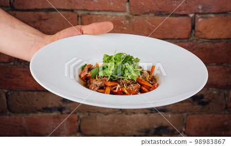 veal with carrots and arugula in plate veal with carrots and arugula in plate 98983867