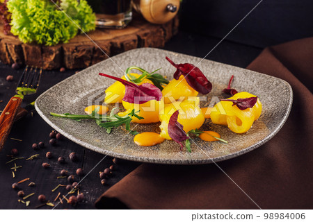 lenten dish of chopped peppers with yellow sauce 98984006