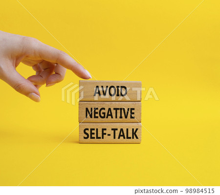 Avoid negative self-talk symbol. Concept words Avoid negative self-talk on wooden blocks. Beautiful yellow background. Bisinessman hand. Business and Avoid negative self-talk concept. Copy space. Avoid negative self-talk symbol. Concept words Avoid negative self-talk on wooden blocks. Beautiful yellow background. Bisinessman hand. Business and Avoid negative self-talk concept. Copy space. 98984515