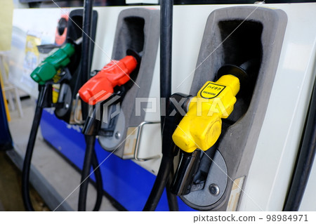 Gas station green red yellow nozzle Gas station green red yellow nozzle 98984971