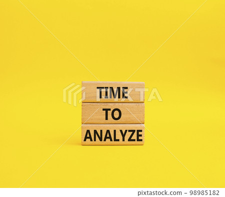 Time to Analyze symbol. Concept word Time to Analyze on wooden blocks. Beautiful yellow background. Business and Time to Analyze concept. Copy space Time to Analyze symbol. Concept word Time to Analyze on wooden blocks. Beautiful yellow background. Business and Time to Analyze concept. Copy space 98985182