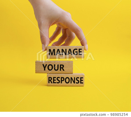Manage your response symbol. Concept words Manage your response on wooden blocks. Businessman hand. Beautiful yellow background. Business and Manage your response concept. Copy space Manage your response symbol. Concept words Manage your response on wooden blocks. Businessman hand. Beautiful yellow background. Business and Manage your response concept. Copy space 98985254
