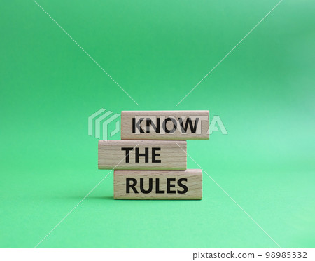 Know the rules symbol. Wooden blocks with words Know the rules. Beautiful green background. Business and Know the rules concept. Copy space. Know the rules symbol. Wooden blocks with words Know the rules. Beautiful green background. Business and Know the rules concept. Copy space. 98985332