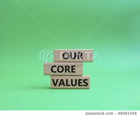 Our core values symbol. Concept words 'Our core values' on wooden blocks. Beautiful green background. Business and Our core values concept. Copy space. Our core values symbol. Concept words 'Our core values' on wooden blocks. Beautiful green background. Business and Our core values concept. Copy space. 98985348