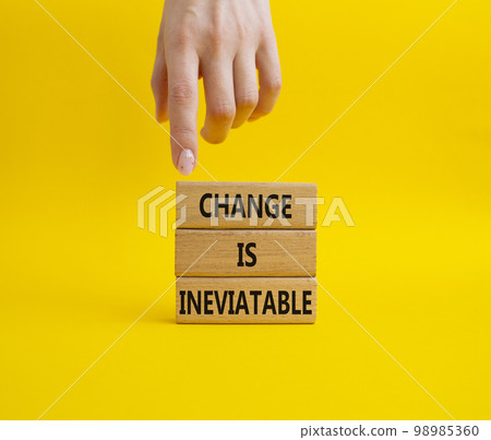 Change is Inevitable symbol. Wooden blocks with words Change is Inevitable. Beautiful yellow background. Businessman hand. Business and Change is Inevitable concept. Copy space. Change is Inevitable symbol. Wooden blocks with words Change is Inevitable. Beautiful yellow background. Businessman hand. Business and Change is Inevitable concept. Copy space. 98985360