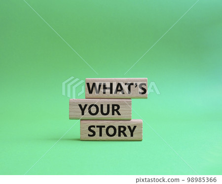 What's your story symbol. Concept words What's your story on wooden blocks. Beautiful green background. Business and What's your story concept. Copy space. What's your story symbol. Concept words What's your story on wooden blocks. Beautiful green background. Business and What's your story concept. Copy space. 98985366