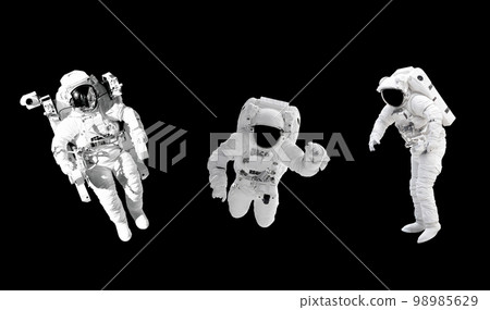 Space suits isolated on black background with clipping path. Elements of this image furnished by NASA. Space suits isolated on black background with clipping path. Elements of this image furnished by NASA. 98985629
