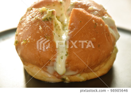 bread bun stuffed garlic cheese sauce arranging on plate bread bun stuffed garlic cheese sauce arranging on plate 98985646
