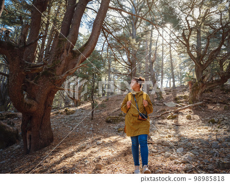 caucasian woman enjoys being in nature, caucasian woman enjoys being in nature, 98985818